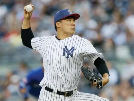  ?? KATHY WILLENS - THE ASSOCIATED PRESS ?? New York Yankees starting pitcher Masahiro Tanaka delivers during the first inning of a baseball game against the Toronto Blue Jays in New York, on Monday.