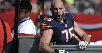  ??  ?? In this Nov. 13, 2016, file photo Chicago Bears o ensive guard Kyle Long (75) tries to fire up his team after he was injured against the Tampa Bay Buccaneers during the second quarter of an NFL football game in Tampa, Fla. AP PHOTO/JASON BEHNKEN