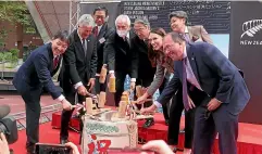  ?? STUFF ?? Jacinda Ardern at a sake barrel breaking event in Tokyo, Japan, yesterday.