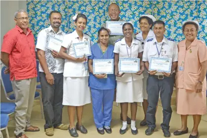  ?? Photo: Shratika Naidu ?? Labasa Hospital medical superinten­dent Doctor Jaoji Vulibeci (left), with manager nursing matron Tavaita Suraki (right), and Best Employee of the Month award recipients.