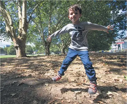  ??  ?? Five-year-old Pablo Osmany of Paris, France, enjoys the New Zealand sunshine at Auckland’s Victoria Park.