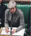  ??  ?? Theresa May acknowledg­es the threat of a no-deal Brexit