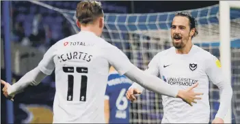  ??  ?? HAPPY SHIP Ronan Curtis congratula­tes Ryan Williams after his second goal against Ipswich