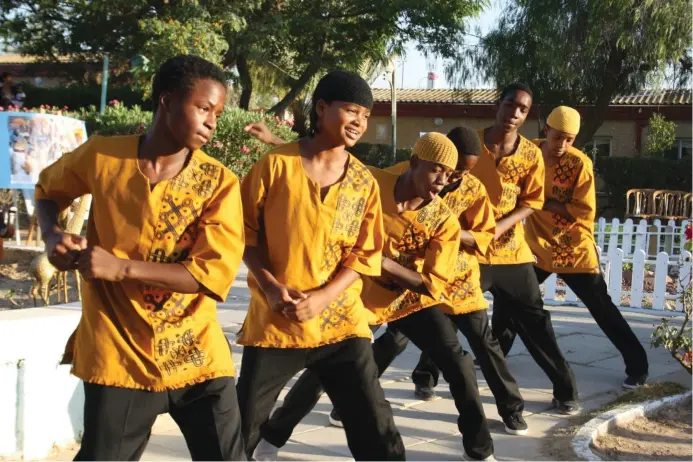  ?? (Photos: Cathrielah Baht Israel and Taahmenyah Baht Israel) ?? THE YOUNGER members of the African Hebrew Israelite community engage in drill team stepping maneuvers.