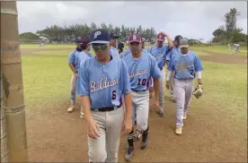  ??  ?? PHOTO: Jai Mashino (foreground), Zack Ota and Dylan Almeida lead a group of blue team players off the field.