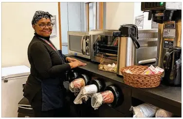  ?? MARK FISHER/ STAFF ?? Patricia Rucker is the owner of Tricia’s Delicious Cafe, which is now open inside the Dayton Metro Library Northwest Branch on Philadelph­ia Drive near Salem Avenue.