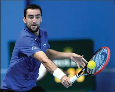  ?? AFP PHOTO/WANG ZHAO ?? TAMBAH POIN: Marin Cilic mengembali­kan pukulan petenis tuan rumah Bai Yan di babak pertama Tiongkok Terbuka. Cilic menang 6-3, 6-4.