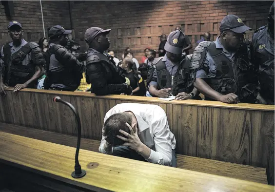 ?? Picture: Jacques Nelles ?? IN DESPAIR. The 22-year-old man accused of raping a seven-year-old at the Dros restaurant in Silverton, in the Pretoria Magistrate’s Court yesterday.