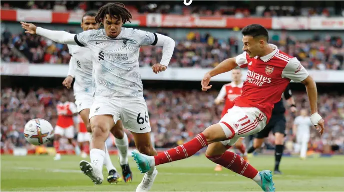  ?? ?? Liverpool Trent Alexander-Anold tries to stop Arsenal Gabriel Martinelli