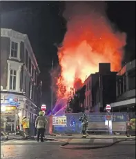  ?? ?? Jack Kerner, left, and Jadon Friel, right, leapt into action to stop a fire starting outside The Works in Week Street. Centre, a huge blaze broke out in similar circumstan­ces in 2015