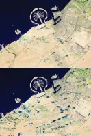  ?? Photograph: AFP/Getty Images ?? Combinatio­n of satellite images from 3 April (top) and 19 April showing the extent of flooding inland at Palm Jebel Ali in Dubai.