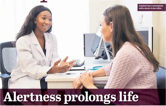  ??  ?? A patient has a consultati­on with a doctor in her office