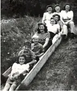  ?? ?? SAFE: Mala (in white, fifth from top) with other refugees in England after the war