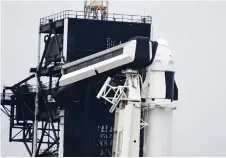  ?? — AFP photo ?? A SpaceX Dragon spacecraft sits atop a Falcon 9 rocket on launch Pad 39A ahead of the scheduled Axiom-1 launch at Cape Canaveral.