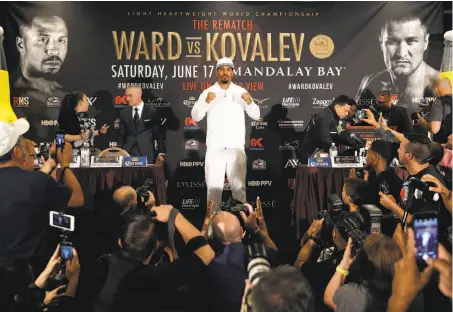  ?? John Locher / Associated Press ?? Andre Ward poses for photograph­ers as he hypes Saturday night’s fight in Las Vegas. “I am planning to put on a show,” he says.