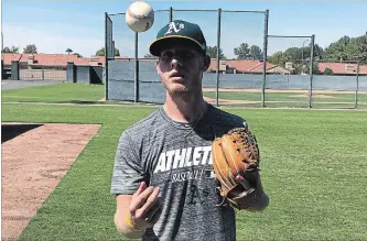  ?? ASSOCIATED PRESS FILE PHOTO ?? Nathan Patterson threw 96 m.p.h. at a fan pitching challenge. Now he’s been signed by Oakland.