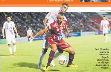  ?? JOHNNY HOYOS ?? Luis Narváez marca al delantero Ángelo Rodríguez, en el juego de anoche en Ibagué.