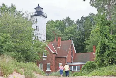  ?? STEVE STEPHENS ?? The historic lighthouse at Presque Isle State Park in Erie, Pennsylvan­ia.