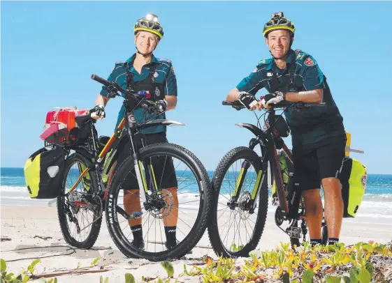  ?? Picture: NIGEL HALLETT ?? Former national mountain bike team member Jane McDonald and critical care paramedic Ricky Arnold are ready to roll.