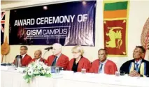  ??  ?? 20 - Seated from left to right: Prof. G. G. Senaratne, the Founder President of GISM, Prof. KKYW Perera, a member of the Advisory Panel of GISM, Prof. Tony Norris, Head of the Institute of Informatio­n and Mathematic­al Sciences at Massey University,...