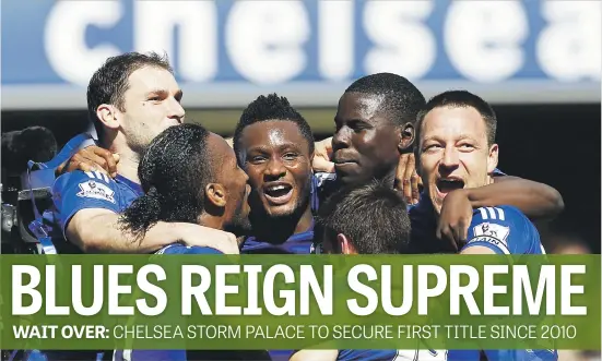  ?? Picture: AFP ?? TOP OF THE WORLD. Chelsea players celebrate after winning the English Premier League title yesterday. The Blues beat Crystal 1- 0 at Stamford Bridge to secure the trophy.