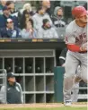  ?? HUH/AP NAM Y. ?? Mike Trout watches his solo home run during the first inning against the White Sox on Sunday.