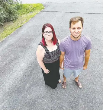  ?? ERROL MCGIHON ?? Sophie Presseaut and Eric Sousa had their Toyota Tacoma truck stolen from their driveway recently. Police suspect recent auto thefts are linked to organized crime.