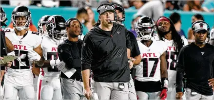  ?? WILFREDO LEE/ASSOCIATED PRESS ?? Head coach Arthur Smith follows the action on the field during the first half of the Falcons’ preseason game against the Miami Dolphins on Saturday in Miami Gardens, Fla.