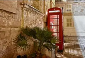  ?? ?? A phone box in Mdina, Malta, is a vestige of British rule of the island nation.