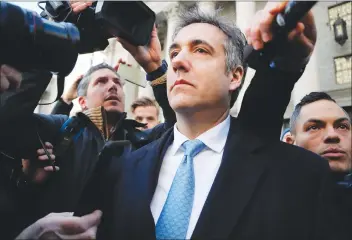  ?? AP PHOTO ?? Michael Cohen walks out of federal court, Thursday. Cohen, President Donald Trump’s former lawyer, pleaded guilty to lying to Congress about work he did on an aborted project to build a Trump Tower in Russia.
