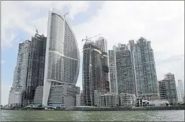  ?? Arnulfo Franco Associated Press ?? THE TRUMP Internatio­nal Hotel and Tower in Panama City, third from left, is at the center of a dispute between the hotel’s owners and Trump executives.