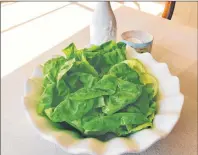  ?? ELIZABETH KARMEL/ASSOCIATED PRESS PHOTO ?? This photo provided by Elizabeth Karmel shows her three-ingredient Luxurious Lettuce Salad, which is deceptivel­y simple but relies on the absolute best ingredient­s for it to be a success.