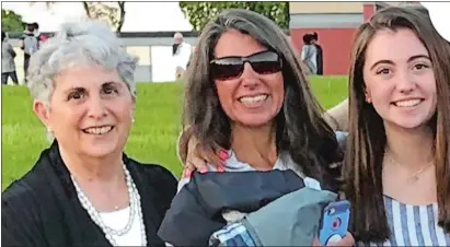  ?? PHOTO COURTESY OF THE MCGUGAN FAMILY ?? Stonington High School sophomore Sandy McGugan, right, a three-sport athlete, says she has learned positivity and humility from her grandmothe­r Carol Ellis, left, and her mother Lauren McGugan, middle.