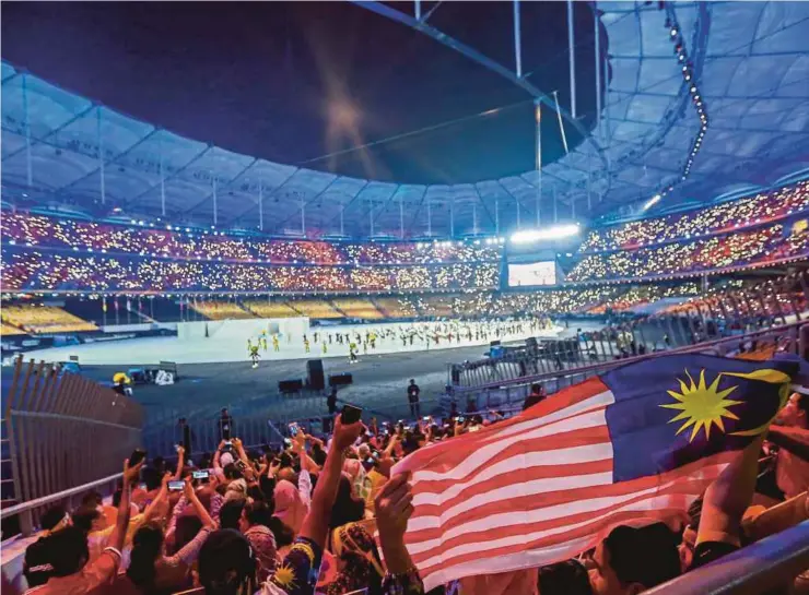 ?? PIC BY ASYRAF HAMZAH ?? The opening ceremony of the 29th Sea Games at the Bukit Jalil National Stadium last night.