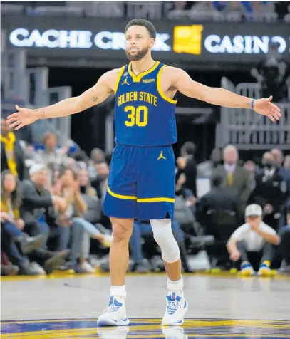  ?? Photo / AP ?? A viral video of Steph Curry making five full-court shots was doctored.