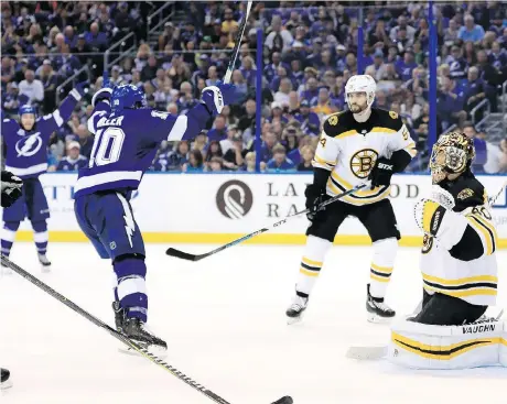  ?? MIKE EHRMANN / GETTY IMAGES ?? Lightning forward J.T. Miller celebrates what turned out to be the winning goal in Game 5 of the Eastern Conference quarter-final series against the Boston Bruins at Amalie Arena on Sunday in Tampa, Fla. Tampa won the game 3-1, and the series 4-1.