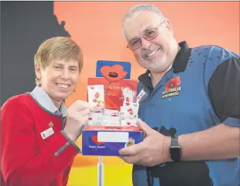  ?? Picture: PAUL CARRACHER ?? POPPIES ARE BACK: Horsham RSL sub-branch poppy appeal officer Sally Bertram and president Don Pirouet are happy that poppy sales will return to traditiona­l shopfront stalls this year.