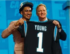  ?? DAVID EULITT/GETTY IMAGES ?? Alabama quarterbac­k Bryce Young didn’t have to wait long to hear his name called, going No. 1 overall to the Panthers.