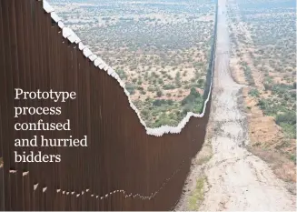  ?? NICK OZA, USA TODAY NETWORK ?? Hundreds of bidders were left bewildered as they tried to submit proposals for the “big, beautiful wall” along the 2,000-mile border between the U.S. and Mexico.