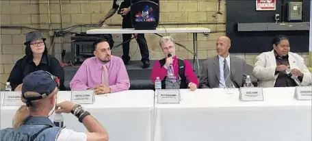  ?? Robin Abcarian Los Angeles Times ?? IN GARDENA, experts and activists discuss legalizati­on. From left: cannabis educator Felicia Carbajal, Latinos for Cannabis founder Gabriel Guzman, attorney Marc Wasserman, California Minority Alliance co-founder Virgil Grant, and Donnie Anderson of...