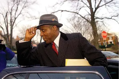  ?? The Associated Press ?? Q In This Jan. 27, 1998, file photo, Vernon Jordan, long-time confidant of President Clinton, leaves his home in Washington. Jordan, who rose from humble beginnings in the segregated South to become a champion of civil rights before reinventin­g himself as a Washington insider and corporate influencer, died Tuesday according to a statement from his daughter. He was 85.