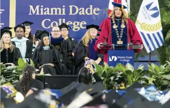  ?? MATIAS J. OCNER mocner@miamiheral­d.com ?? Miami Dade College President Madeline Pumariega speaks during a graduation ceremony inside loanDepot Park on Saturday.