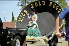  ?? KIMBERLY MORALES — ENTERPRISE-RECORD. ?? Gold Nugget Queen Rachael Brennan and her escort Aiden Luna start off the Paradise Gold Nugget Parade on April 23 in Paradise.