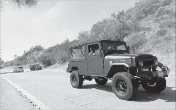  ?? Photograph­s by Myung J. Chun Los Angeles Times ?? JOEL McHALE’S ICON FJ-43 is a custom-crafted version of the classic 1970 Toyota Land Cruiser, built in Chatsworth. The actor also owns a Porsche Turbo S and a Tesla Model X, falcon-wing doors and all.