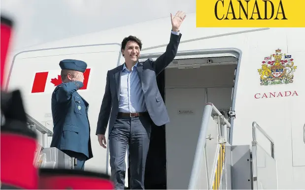 ?? ADRIAN WYLD / THE CANADIAN PRESS ?? Prime Minister Justin Trudeau arrives in the Philippine­s Sunday for the ASEAN summit. The meeting will give Trudeau an opportunit­y to advance his trade agenda with the emerging bloc of 10 Southeast Asian countries, which is already Canada’s...