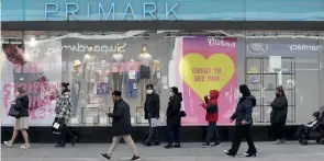  ?? (SIPA) ?? People queue to get into Primark store on Oxford Street, London, April 2021.