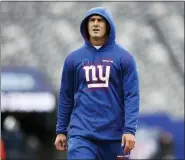  ?? STEVE LUCIANO/THE ASSOCIATED PRESS, FILE ?? In a Dec. 19, 2021, photo, New York Giants quarterbac­k Daniel Jones works out before the team’s game against the Dallas Cowboys in East Rutherford, N.J.