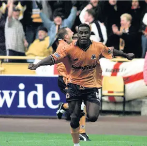  ??  ?? Ade Akinbiyi celebrates his goal