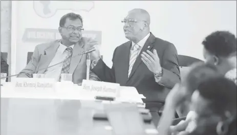  ??  ?? From left are AFC Chairman Khemraj Ramjattan and APNU Chairman Joseph Harmon