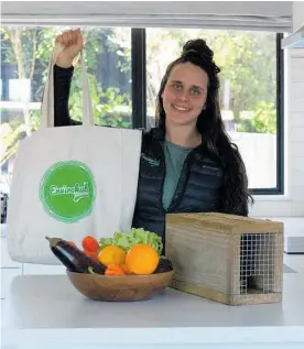  ?? ?? Envirohub’s Sustainabl­e Backyards co-ordinator Hannah Thain.